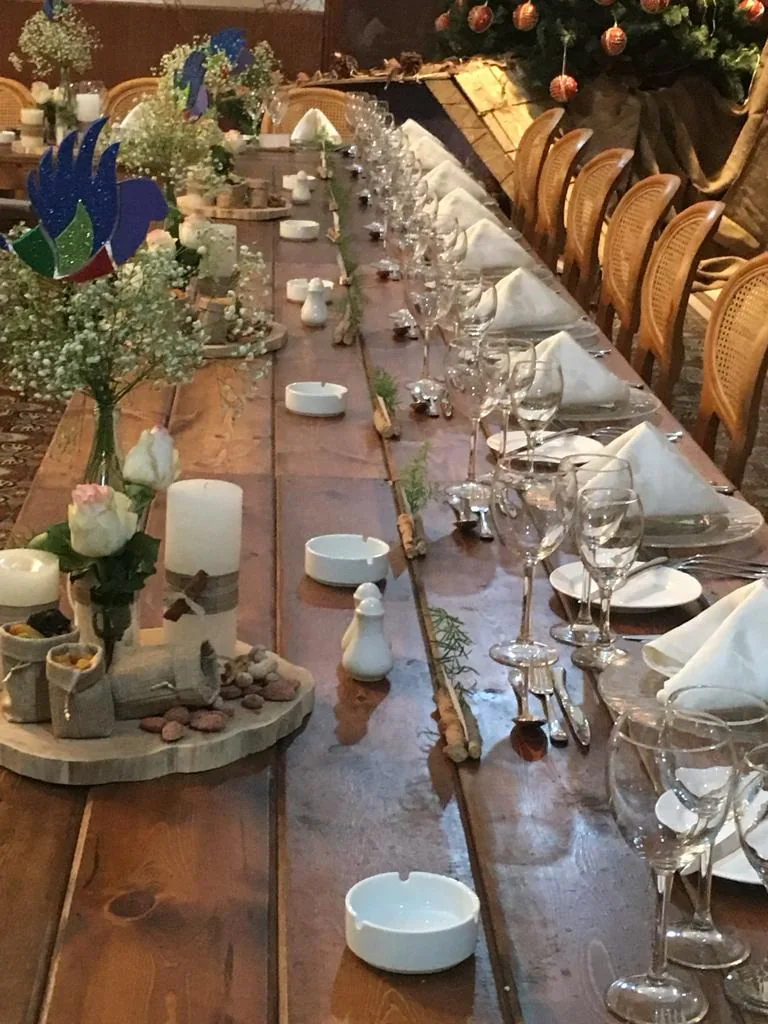 Elegant long dining table prepared for a catered event
